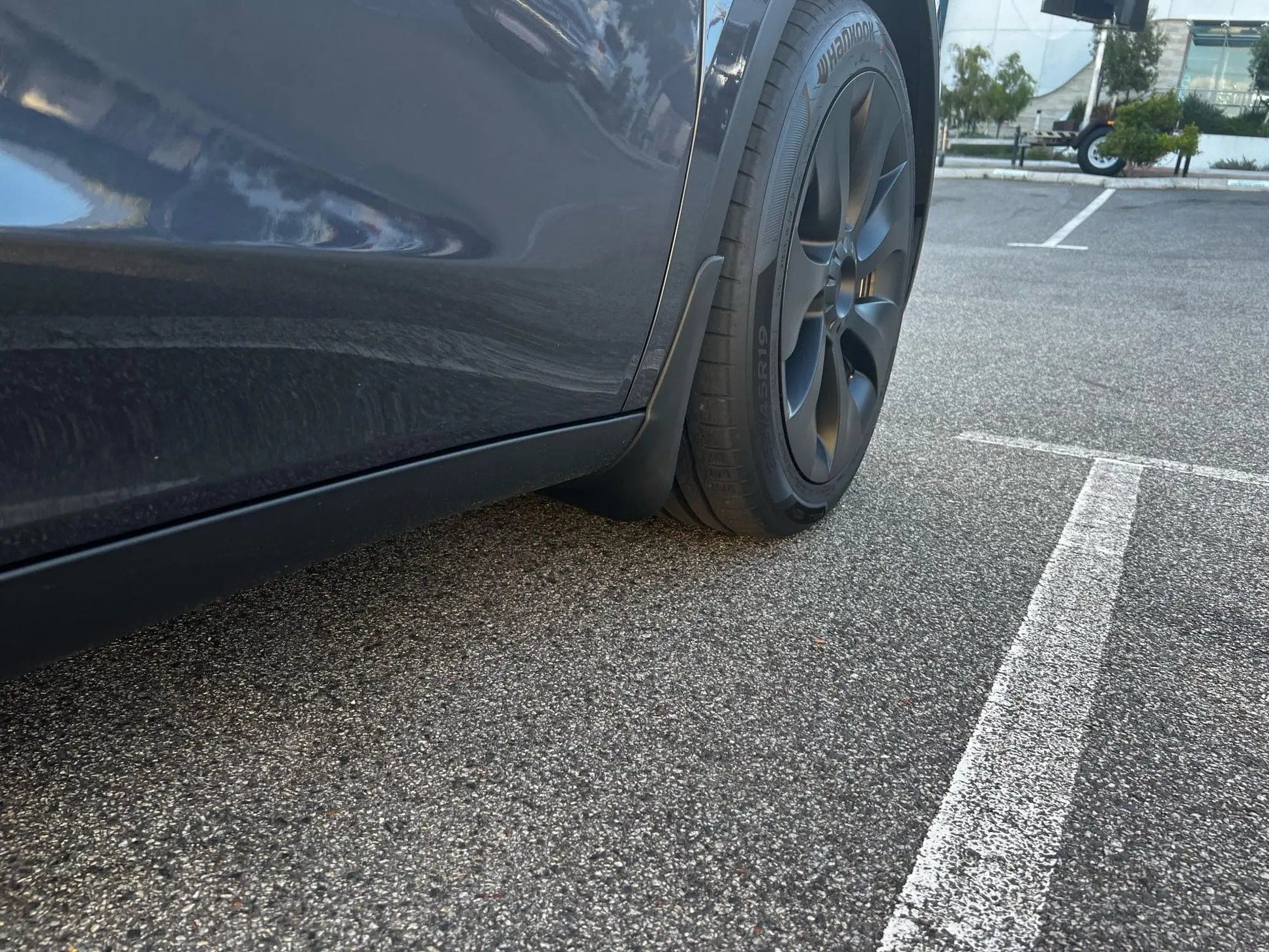 Model Y Carbon Fiber Splash Guard — Installation View